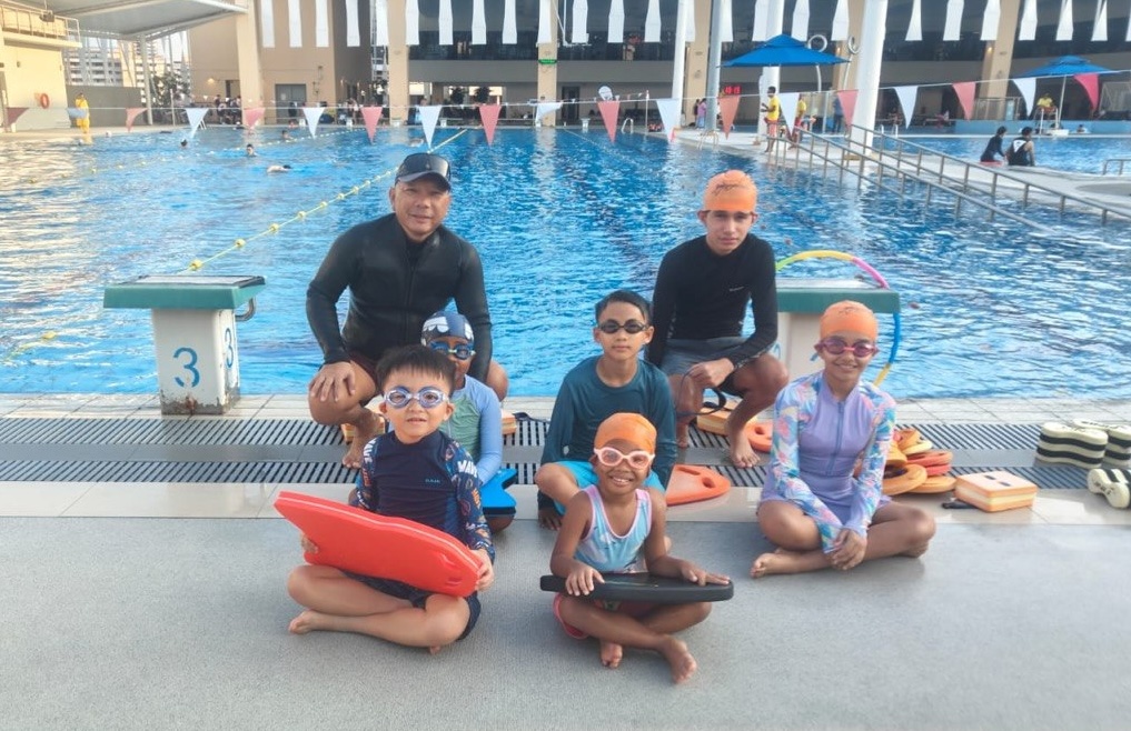 SwimInSG certified swimming coach Singapore